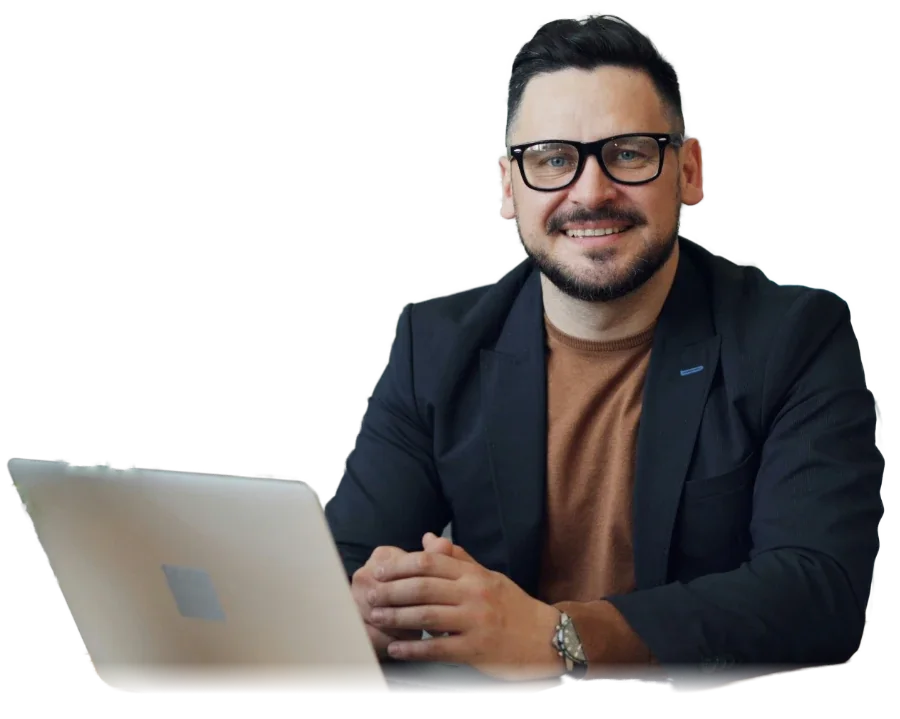 The boss smiling at his laptop