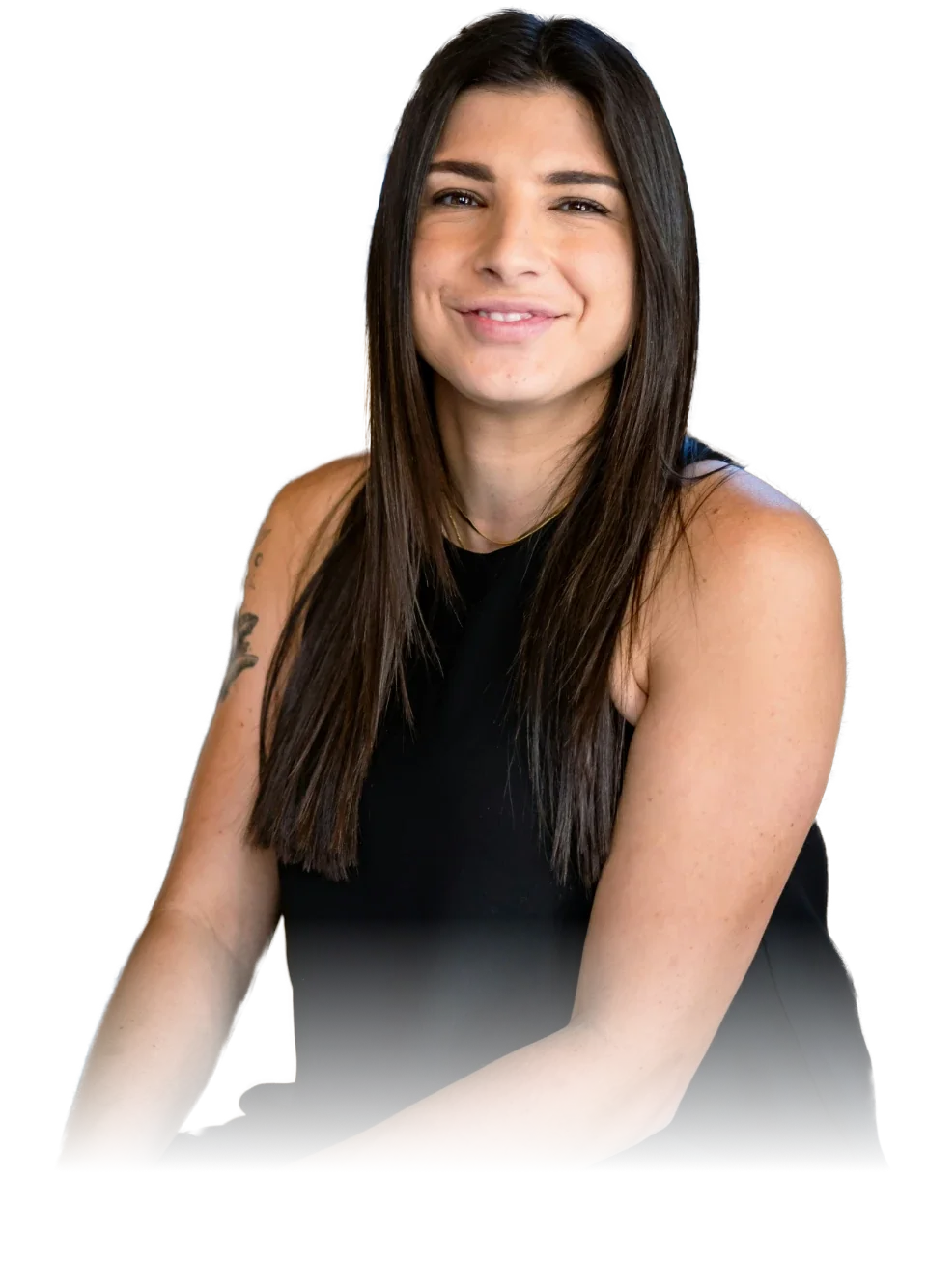 A smiling woman in a black top